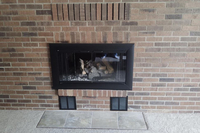 Reflection Textured Black Custom Masonry Fireplace Trackless BiFold Door with Clear Tempered Glass