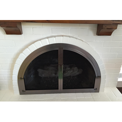 We even have beautiful arched fireplace doors!
