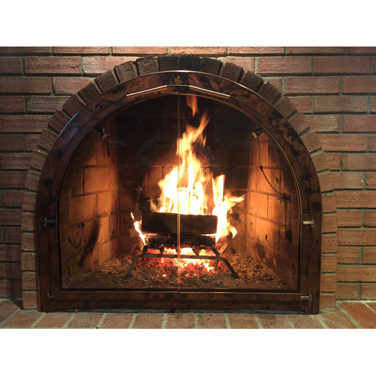 A real customer photo of their Full Arch Fireplace Door!