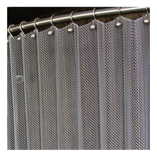 Brite Aluminum Serenity mesh shower curtain shown with optional ball hooks and curved shower rod