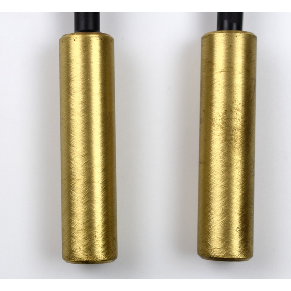 Closeup of the solid satin brass mesh curtain pulls