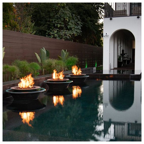 Cazo 360° Spill Copper Fire and Water Bowl by the pool lifestyle