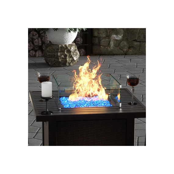 The Outdoor Plus Tempered Wind Guard on top of Fire Pit