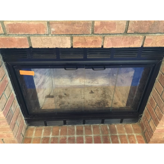 The Nightwell Fireplace Door in matte black for prefab fireplaces - March 2018 customer installation!