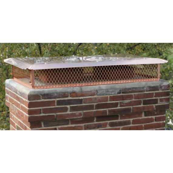 Big Top Copper Multi-Flue Chimney Cap in 3/4" Mesh on a Chimney