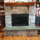 The Fremont Masonry Fireplace Door installed in a satisfied customer's home! His wife is happy, too!