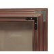 Huntress fireplace door double corner brackets - door shown in anodized Vintage Copper