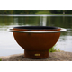 Finished in iron oxide patina that will beautifully mature over time